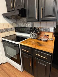 Stove with workspace and utensils
