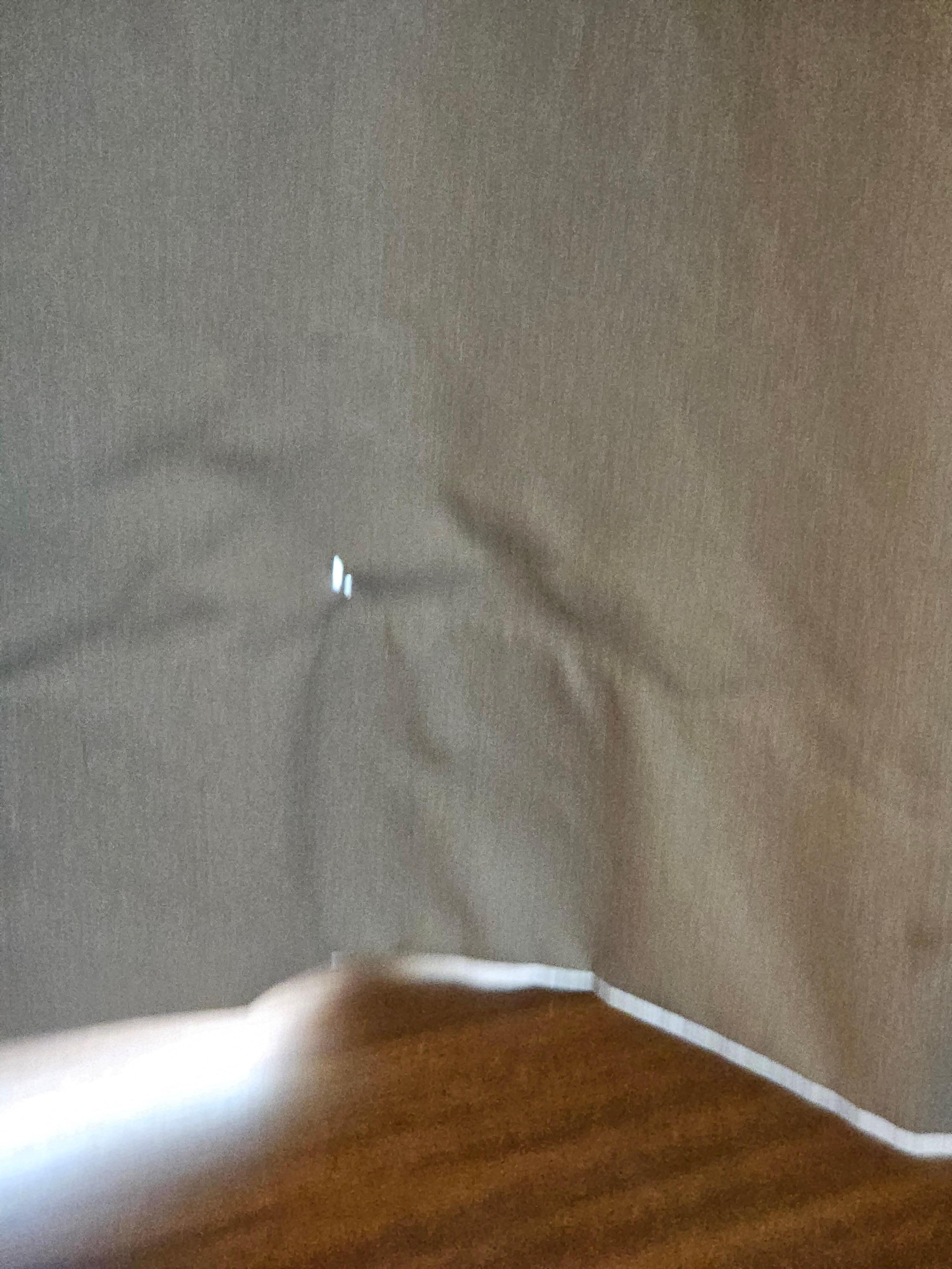 hole in curtain