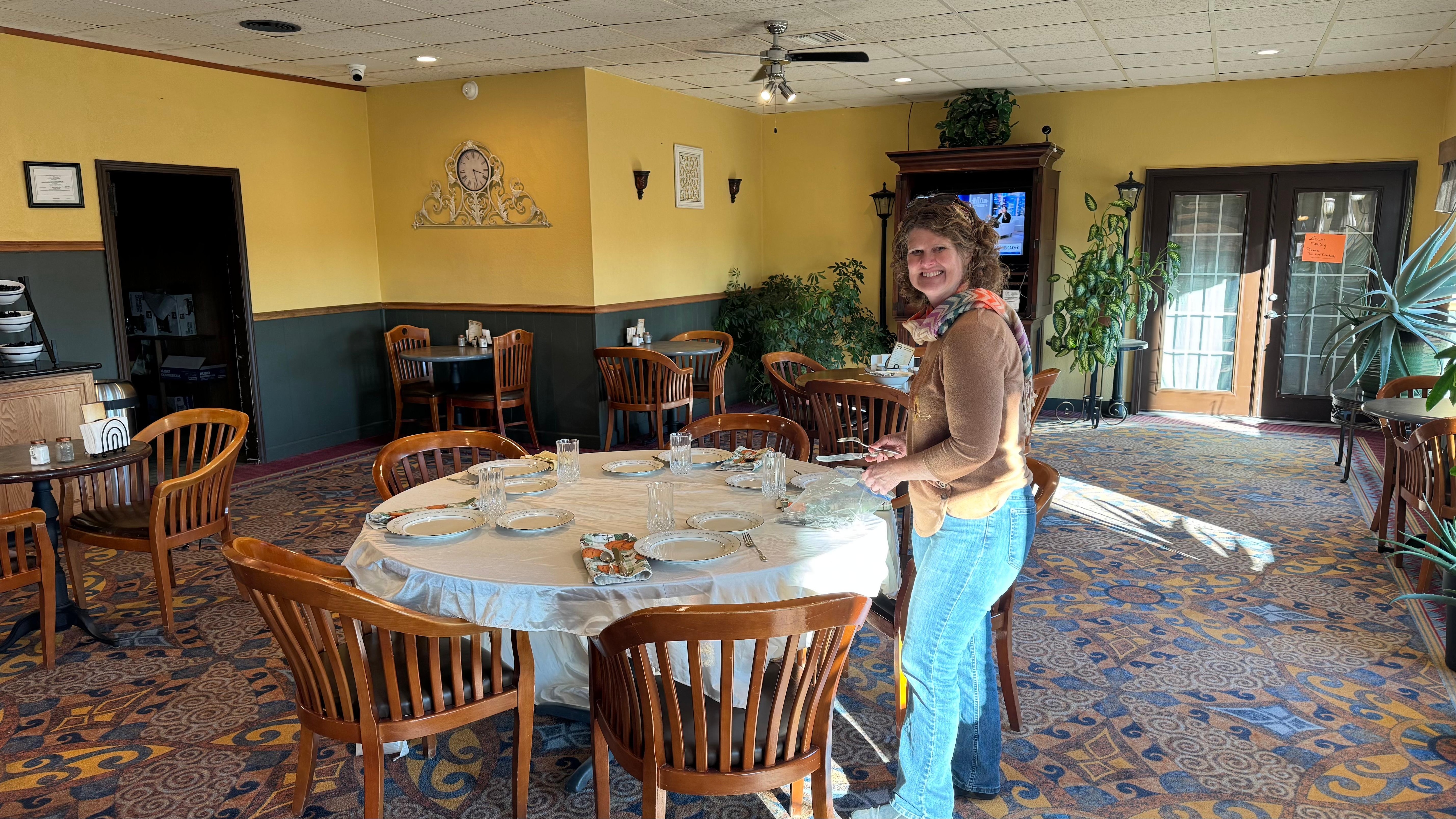 Preparing for our Thanksgiving meal in the dining room.