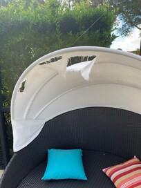 Ripped sunlounger canopy