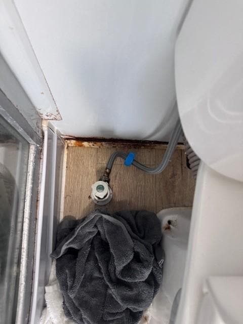 Rust and soaking wet towels from leak.