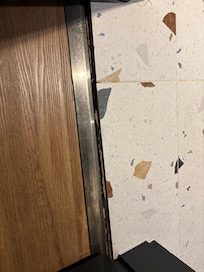 Unsecured Bathroom threshold where my wife scratched her foot.