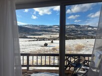 Beautiful view from living room window overlooking animals and mountains. No neighbors nearby!