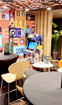 A living room in the same area with the reception.