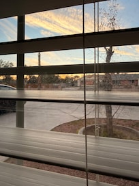 The view of the drive way / neighborhood