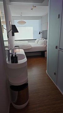 Room was comfortable and easy to manage. Lightings, blinds, TV, wake up alarm were all controlable through IPad.