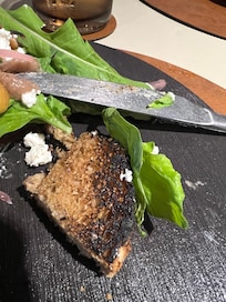 Goats cheese starter, this isn’t rye bread and it’s burnt. Also picked red onion?