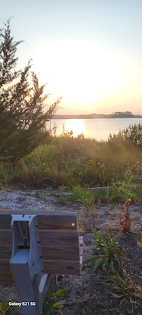 A sitting area on the path to the fishing pier and mini beach