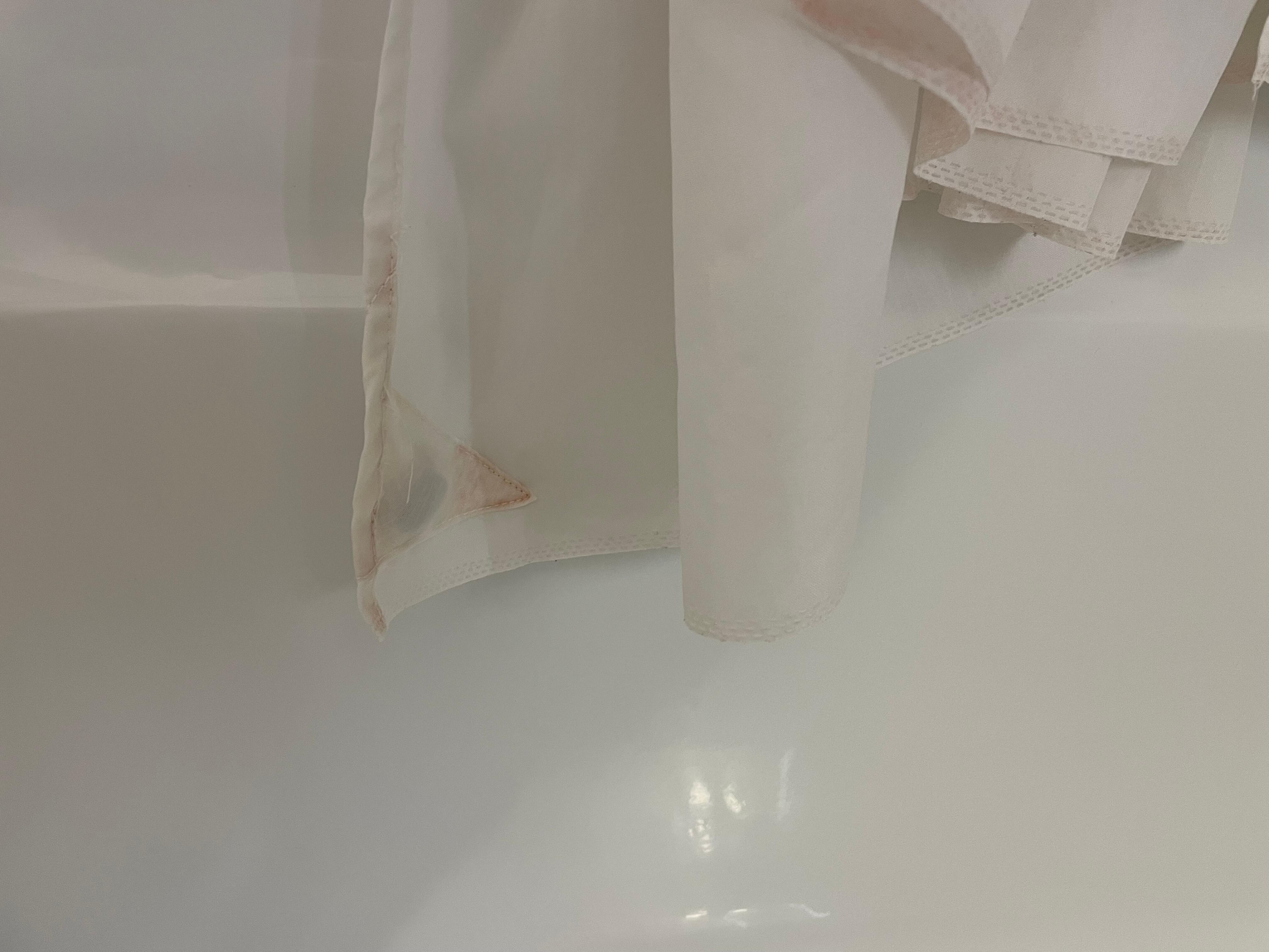 Moulding on shower curtain