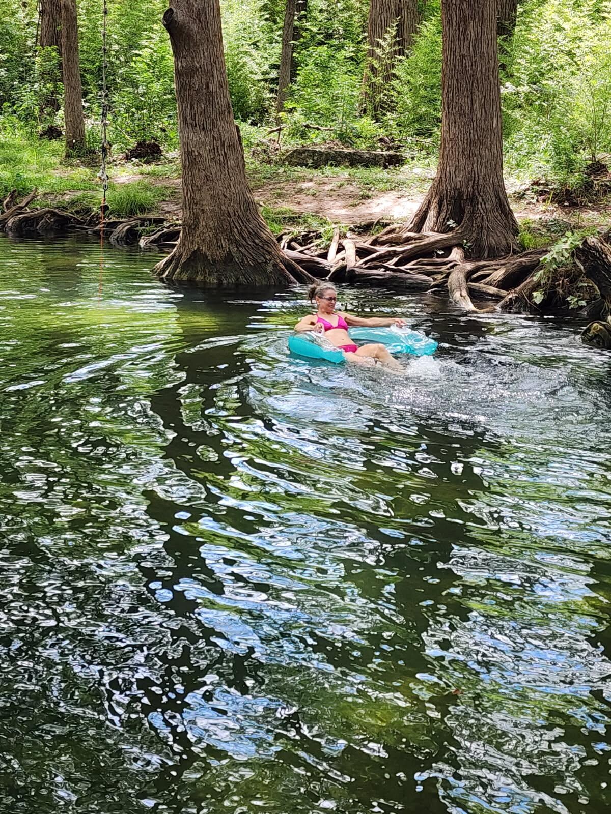 Floating in Cypress creek just behind the house. 