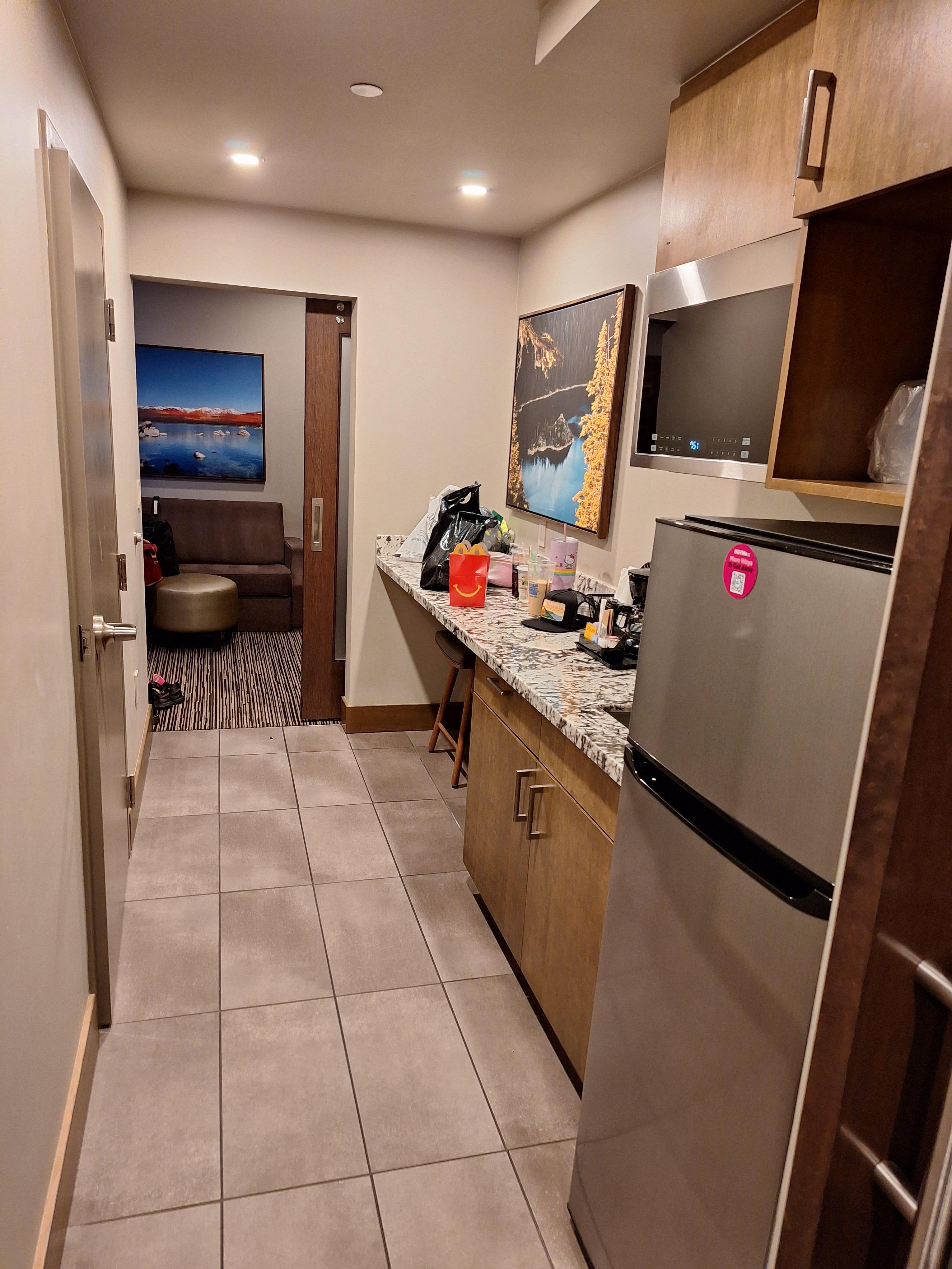 Kitchenette area with full sized fridge