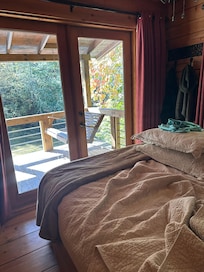 You can see the creek from one bedroom and the hillside from the other