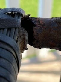 Rusted chair on the balcony.
