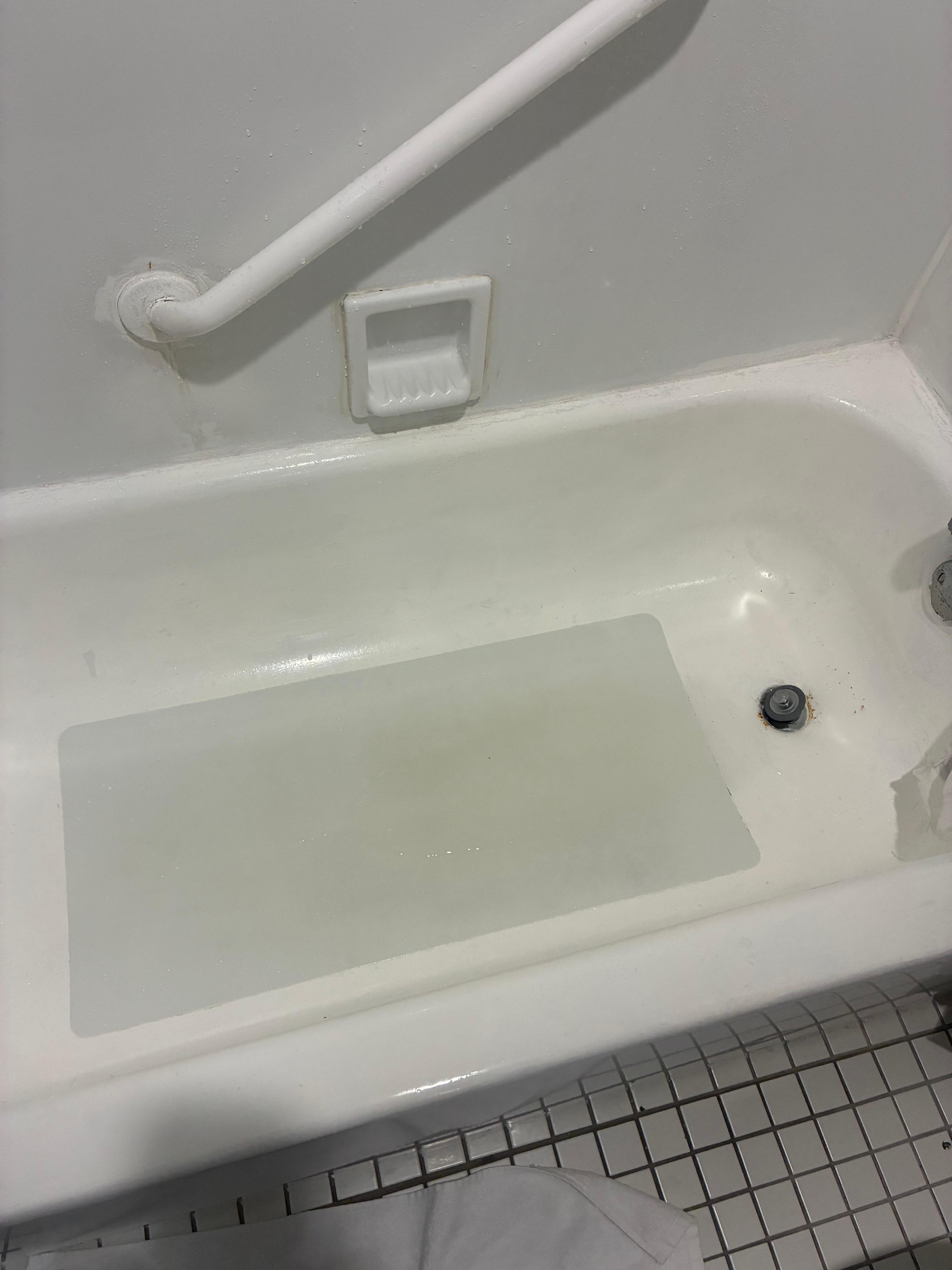 Dirty ring around the tub and found a dirty rag as well when we first walked in.