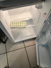Frig with stuck on ice tray disgusting!! Reality check guys!