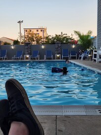 View of the pool - lots of seating and even some pool toys for the kids to play with.