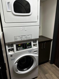 To the right of the washer dryer there are also soap and dryer sheet vending machine $1.50 Canadien dollar per machine or soap.