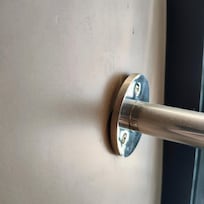 Clothing bar pulling out of the wall