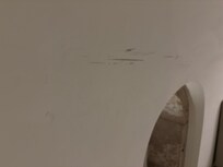 Scrapes on wall