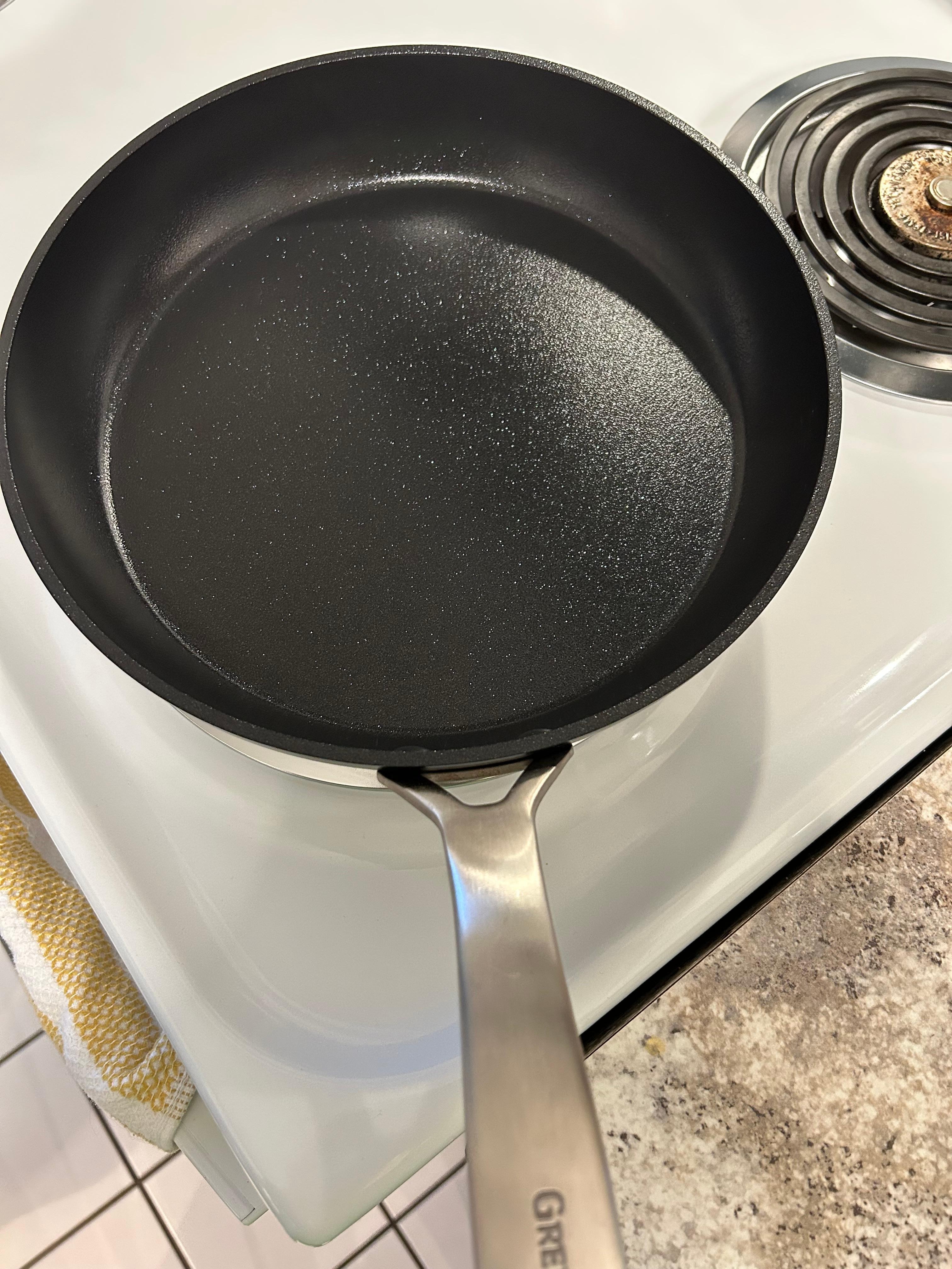 The pan was fine after it was heavily scrubbed. So, it just wasn’t washed properly before it was put away. 
