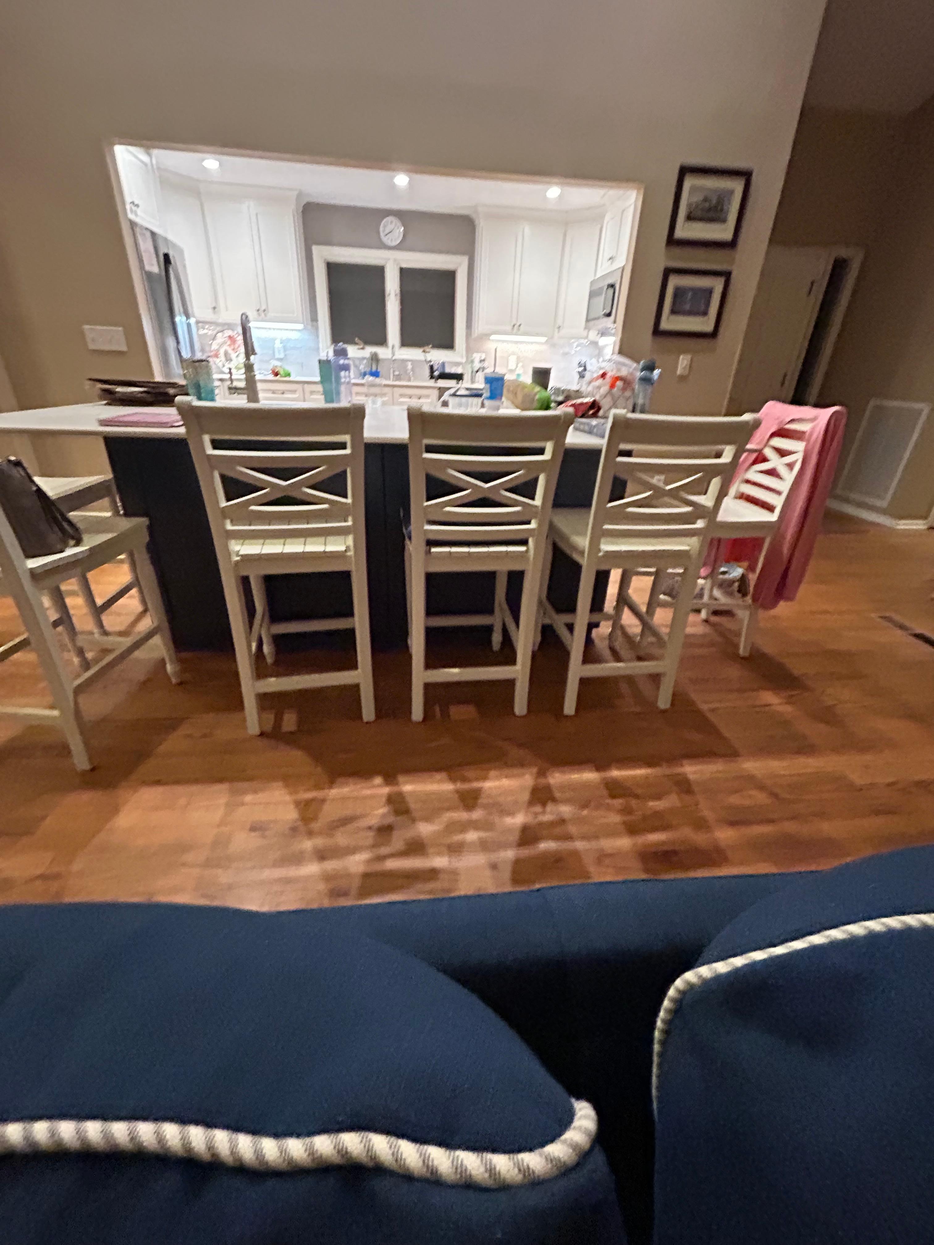 From the living room toward the island a the kitchen