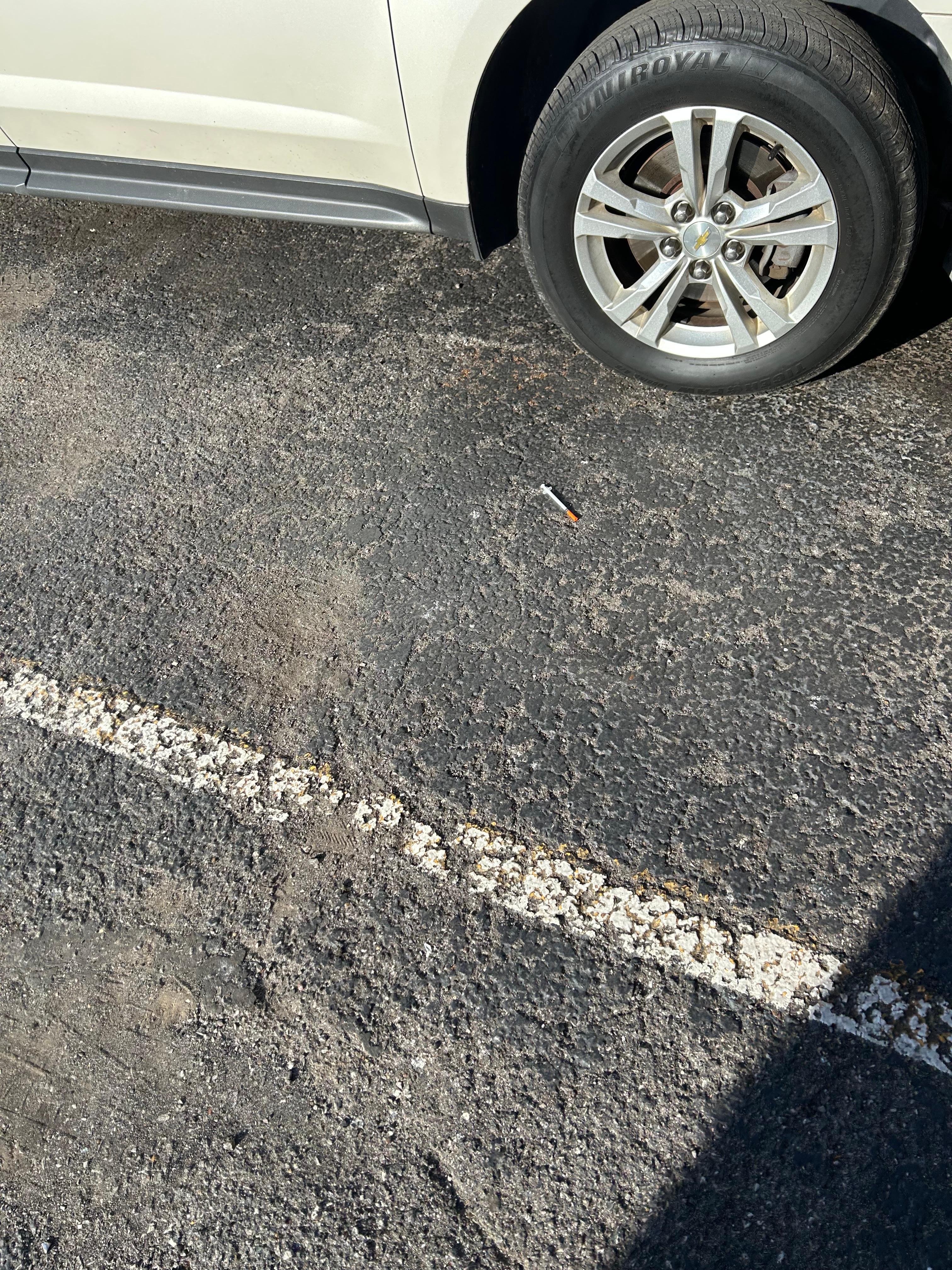 First thing we see when pulling around to the back. Heroin needle.. 