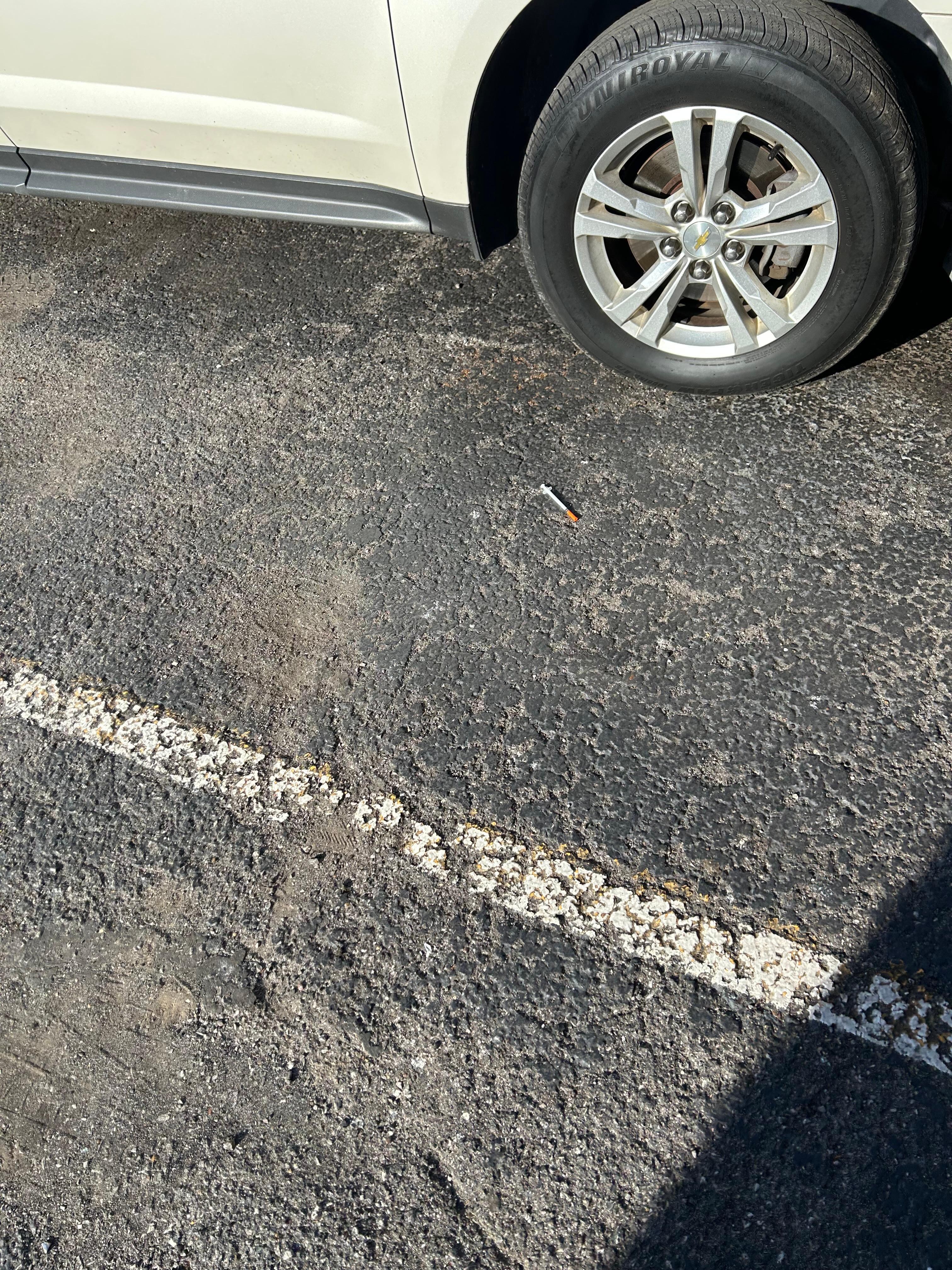 First thing we see when pulling around to the back. Heroin needle.. 
