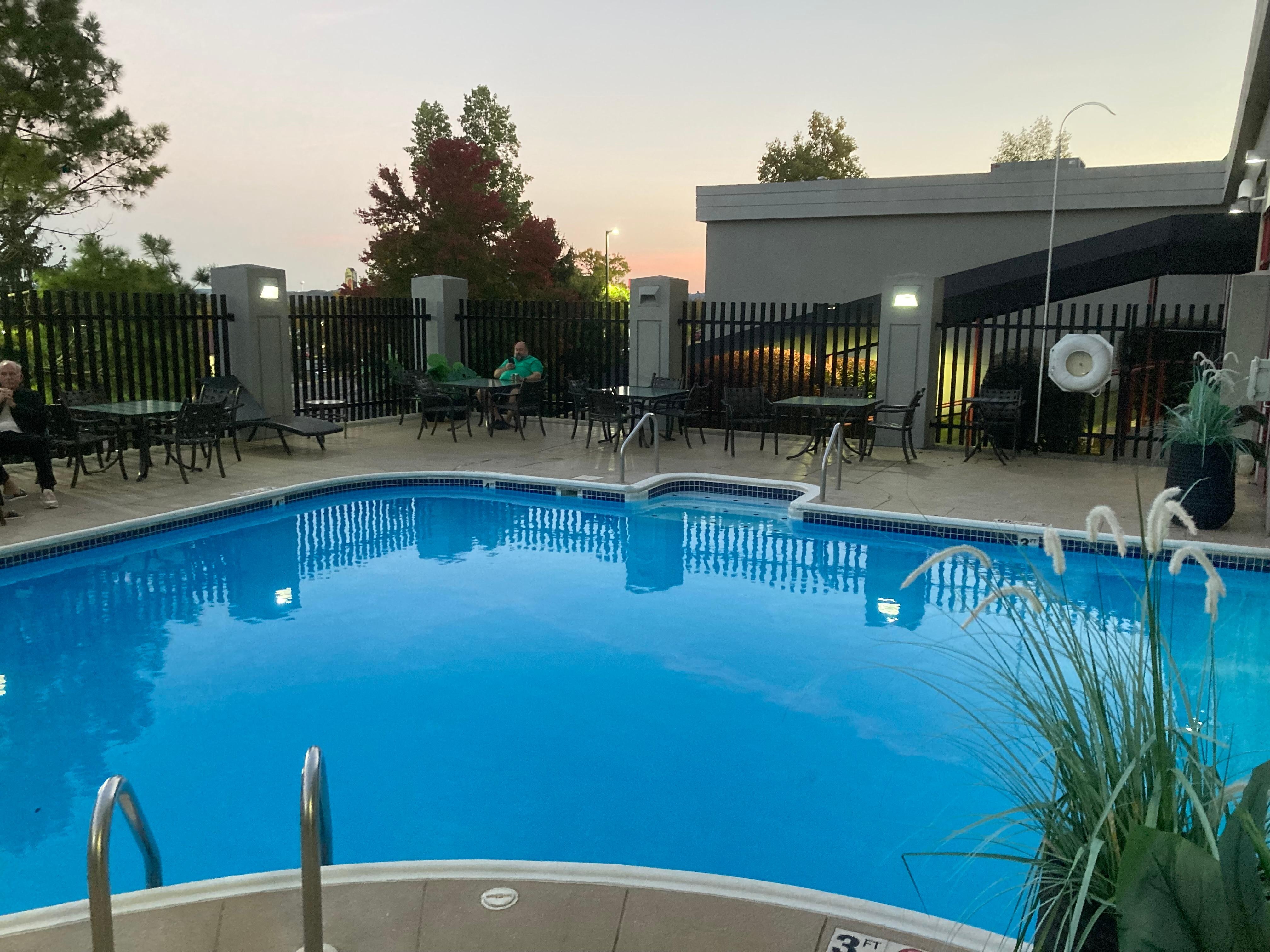 Outdoor side of the pool where you can go under the wall back and forth.