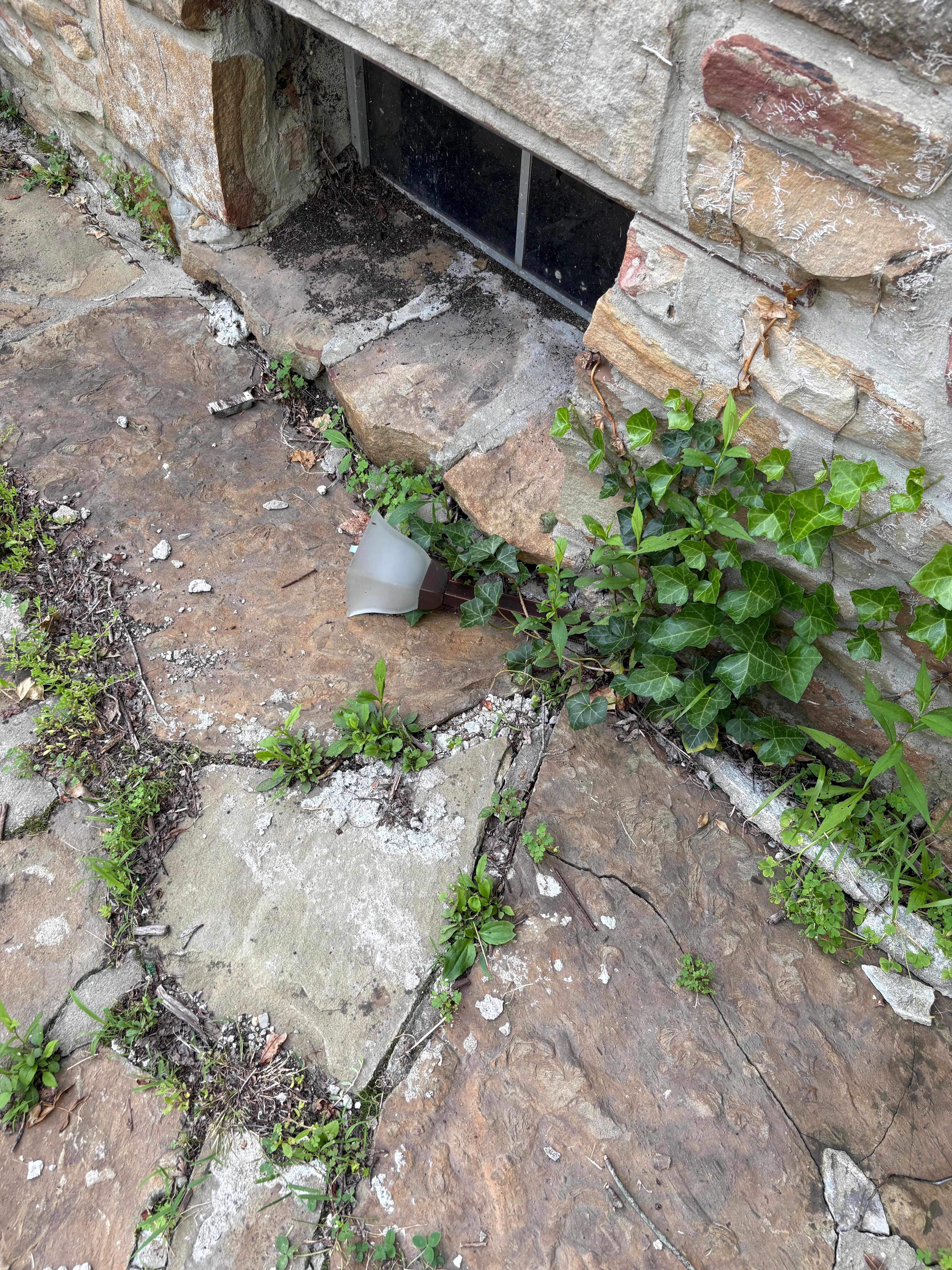 Broken outdoor lighting. 1 of many