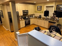 From the entrance landing overlooking the kitchen.