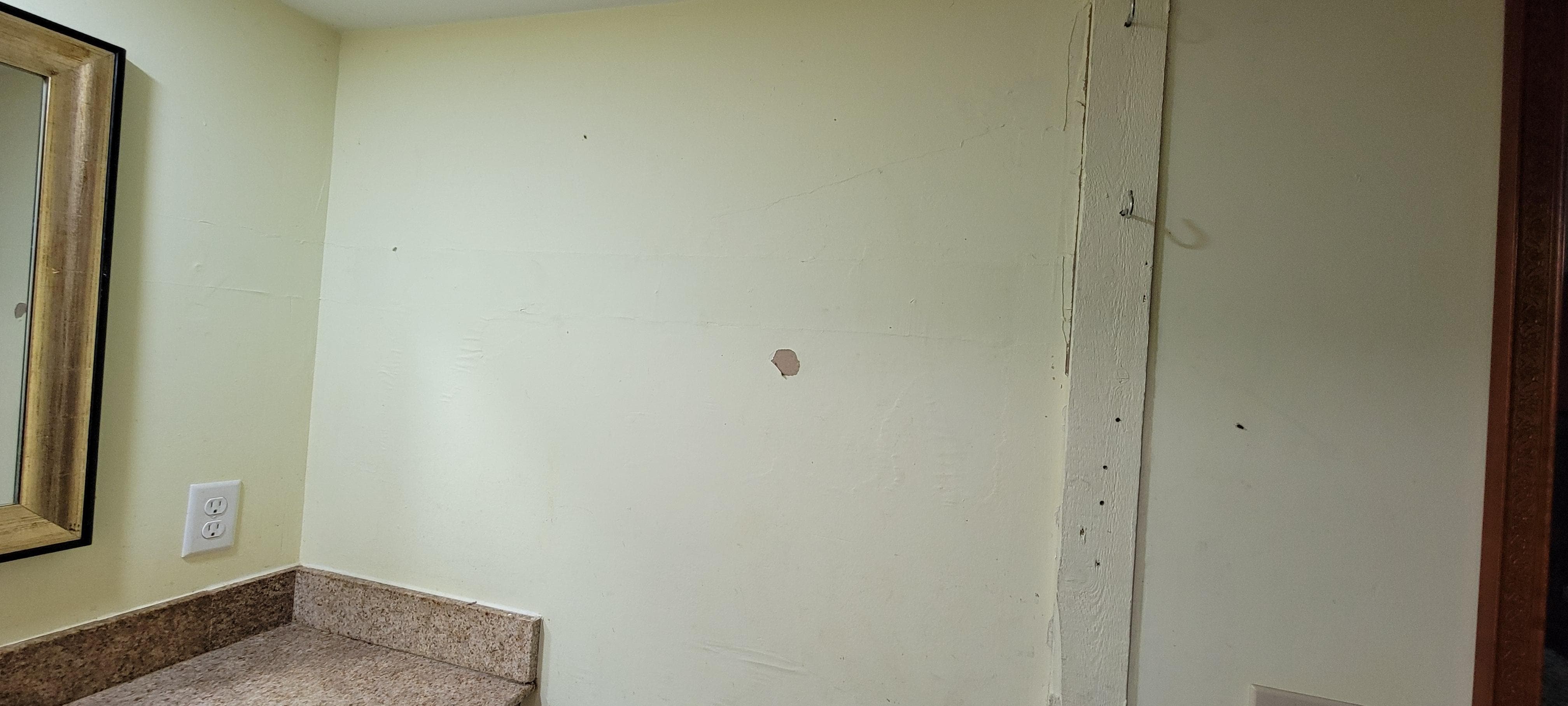 Walls looked like someone threw coffee all over them