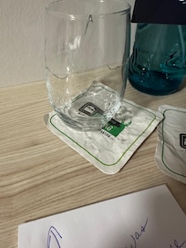 Broken glass and old coaster