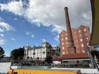 The rooms are actually in the old factory brick building to the right.