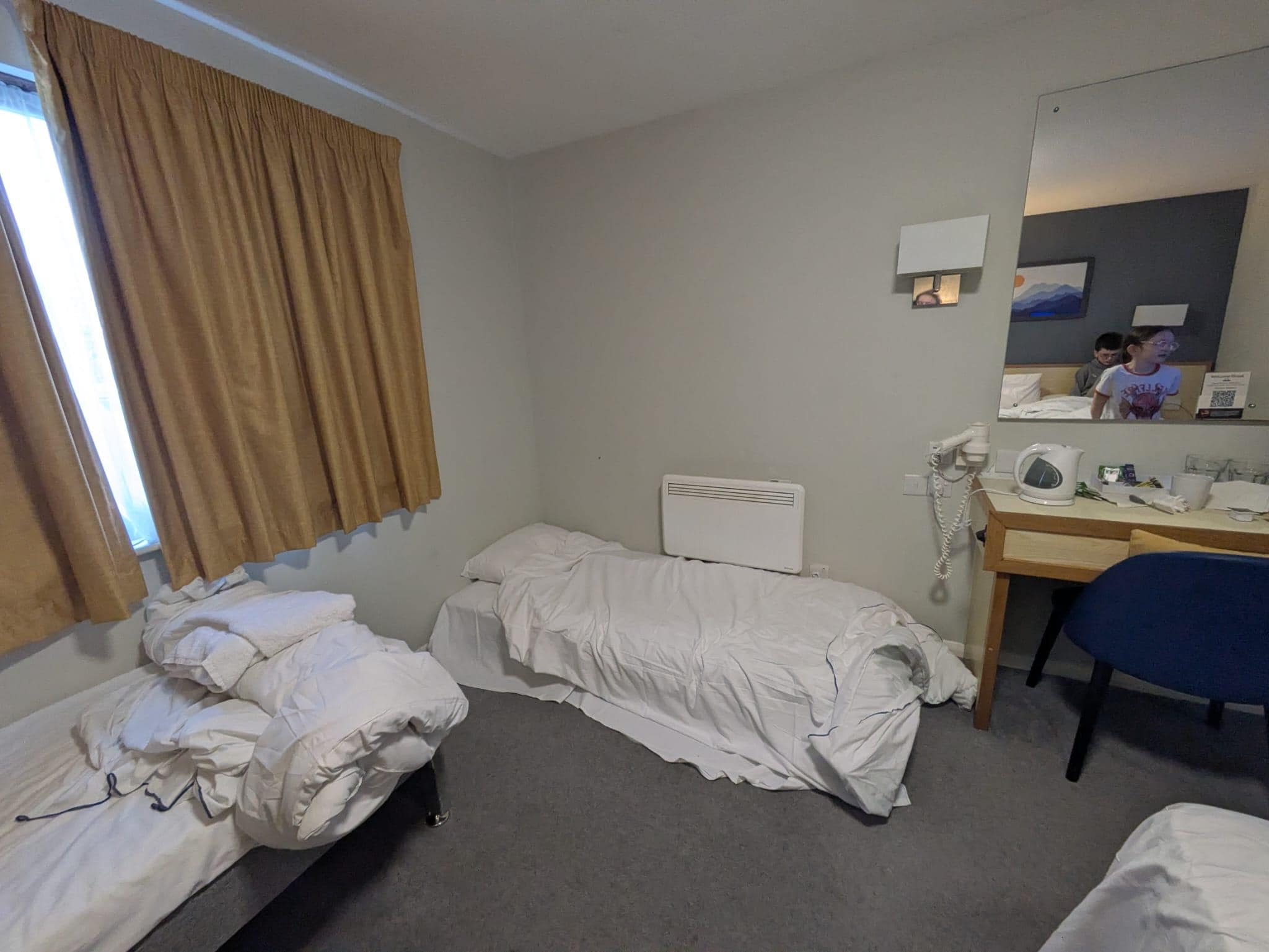 Child's bed right next to a very hot radiator. Which is absolutely unsafe and dangerous and against all safety regulations. And like a dog bed as a mattress on the floor of pet friendly room which is not as described, when booked.