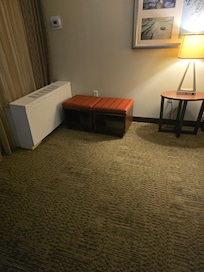 Paid for a suite but did not have a suite. I guess the two ottomans is the sofa