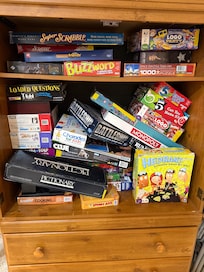 The basement has a cabinet full of games