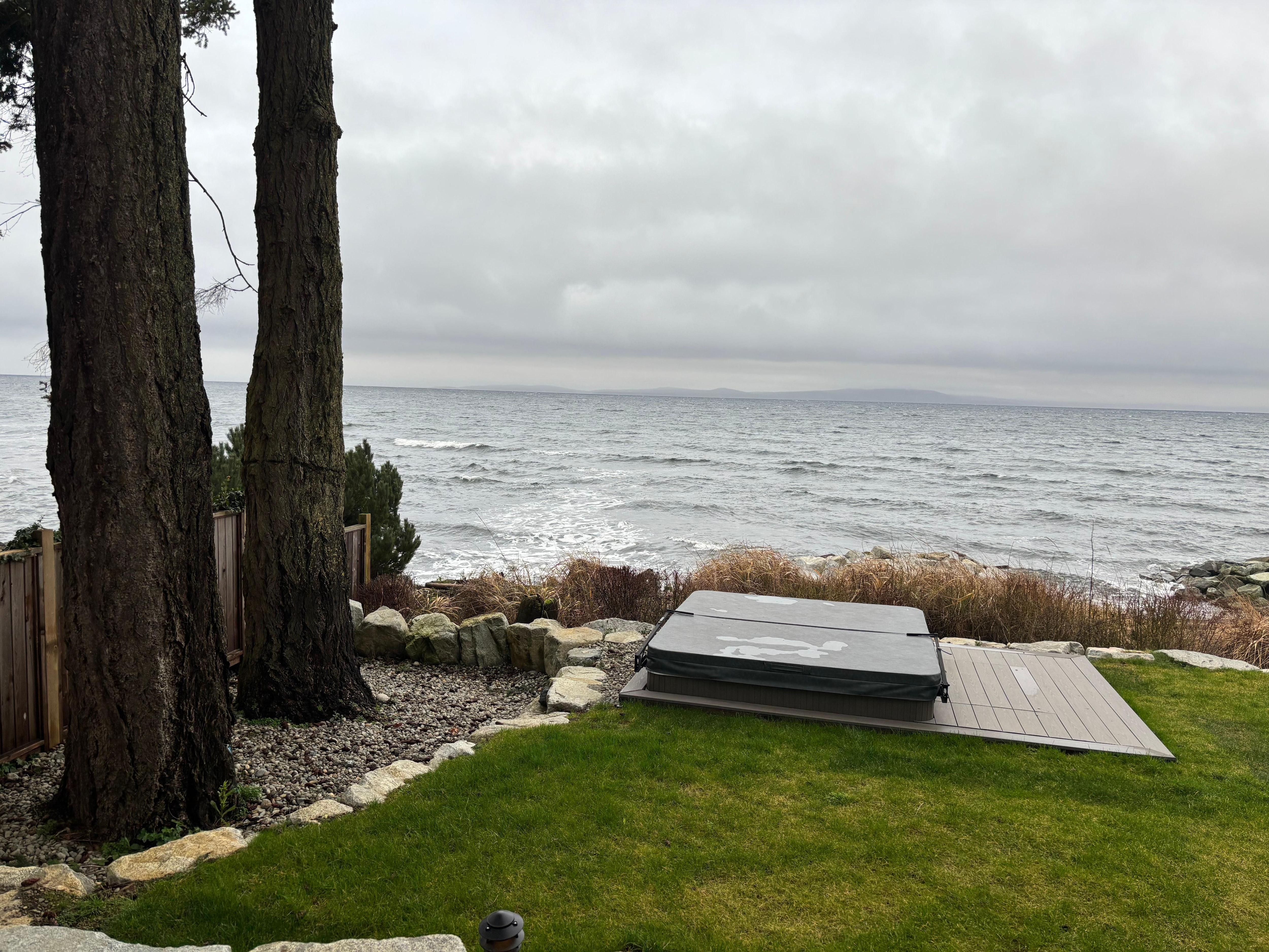 View of hot tub and ocean from our suite