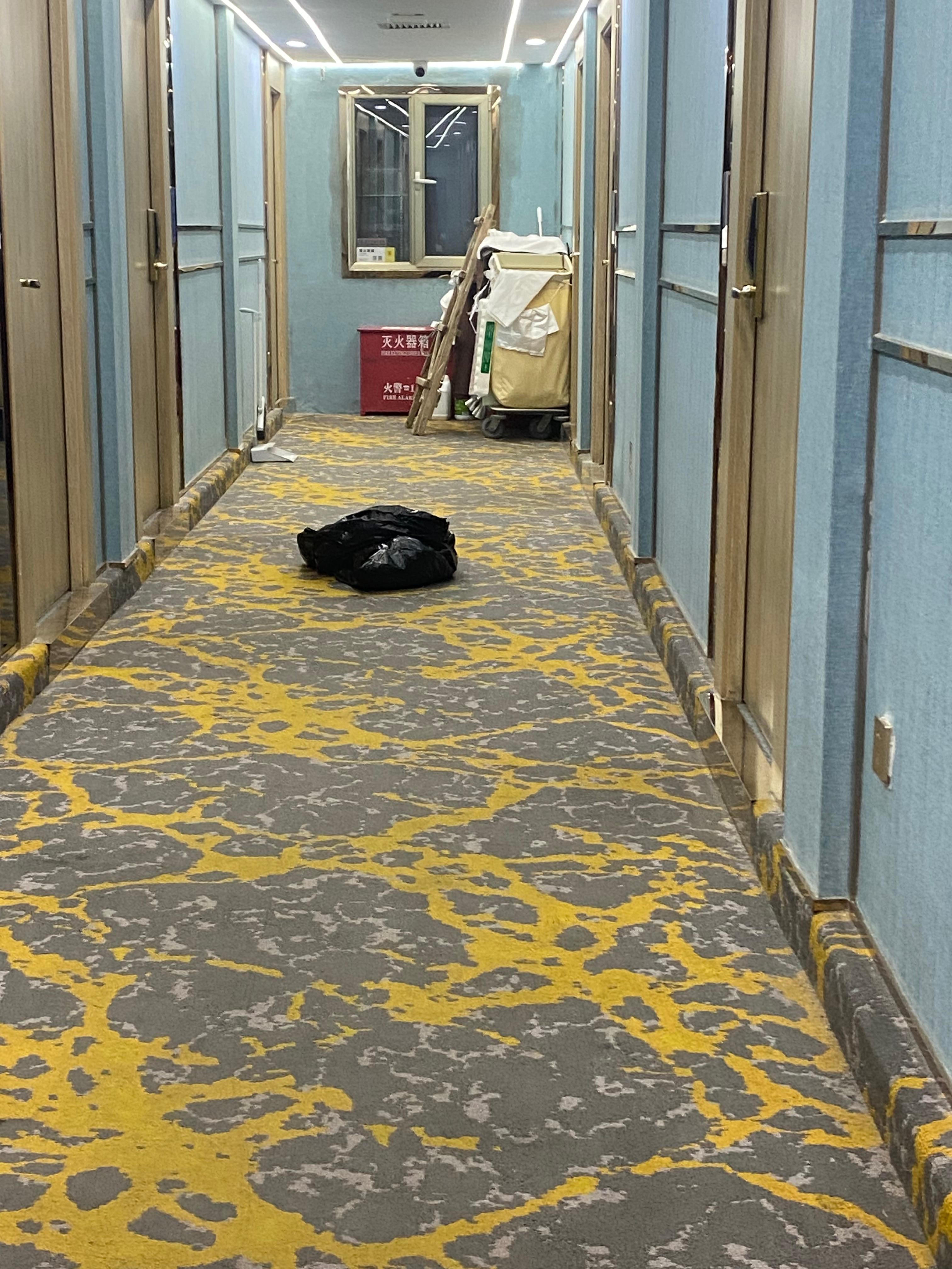 Trash in the hallway the day of check in