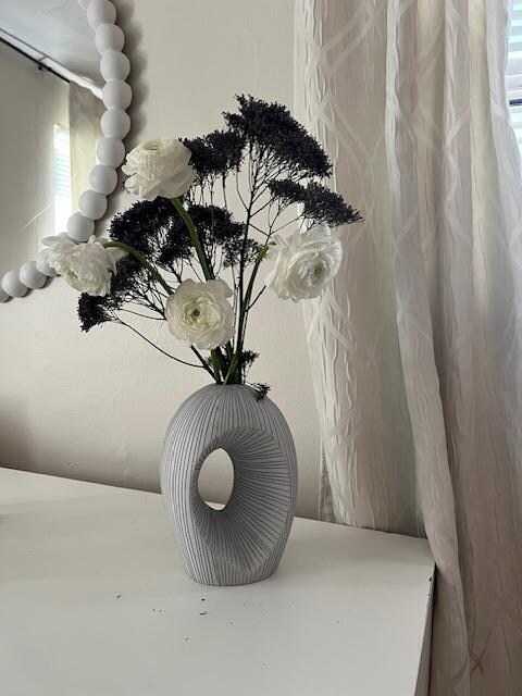 vase in bedroom from Boston art museum