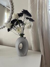 vase in bedroom from Boston art museum