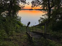 Sunset from the rental property. Wood ducks swimming by.