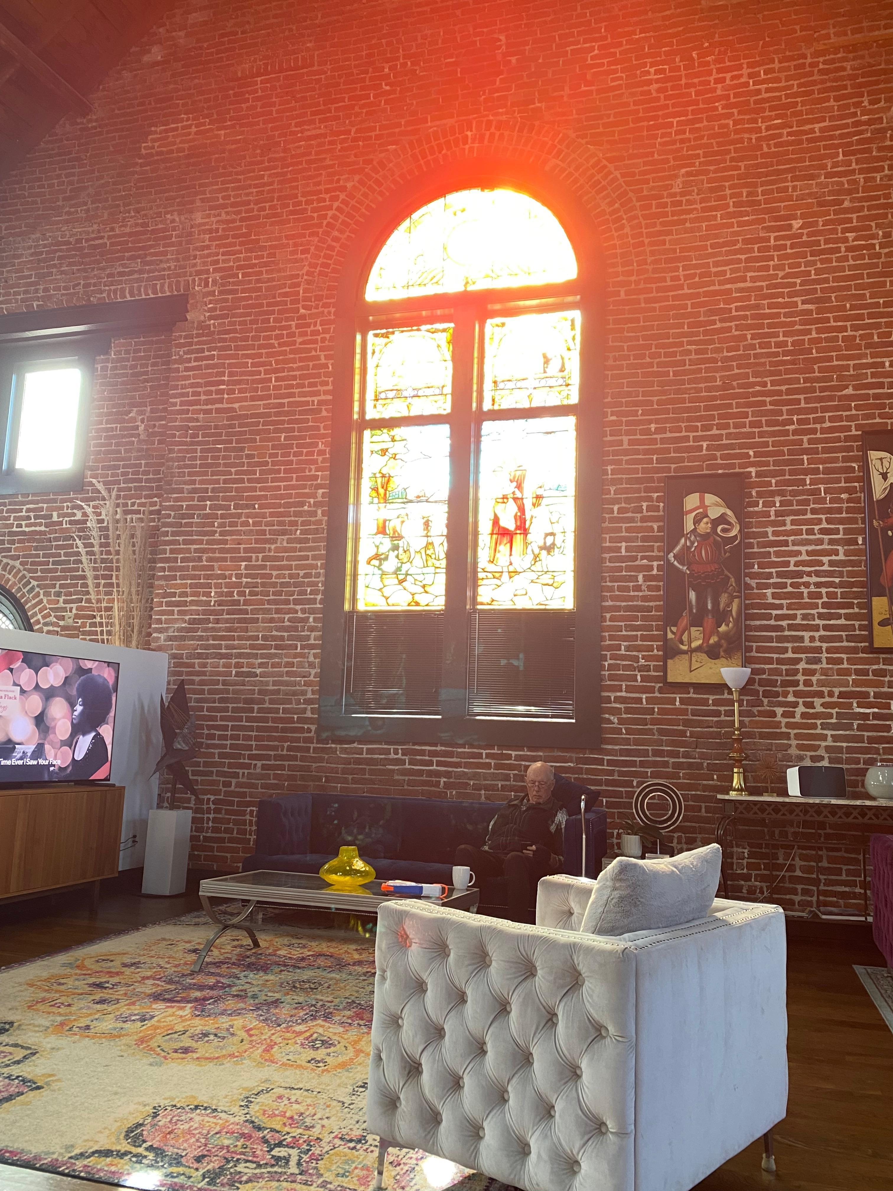 Sun coming thru the stained glass window