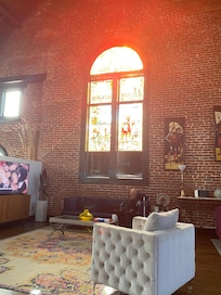 Sun coming thru the stained glass window