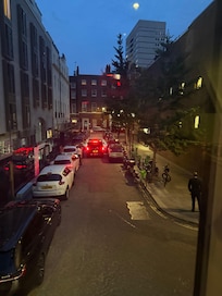 Taxi queue outside of flat at night