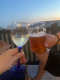 sunset drinks with nice glasses provided by the host