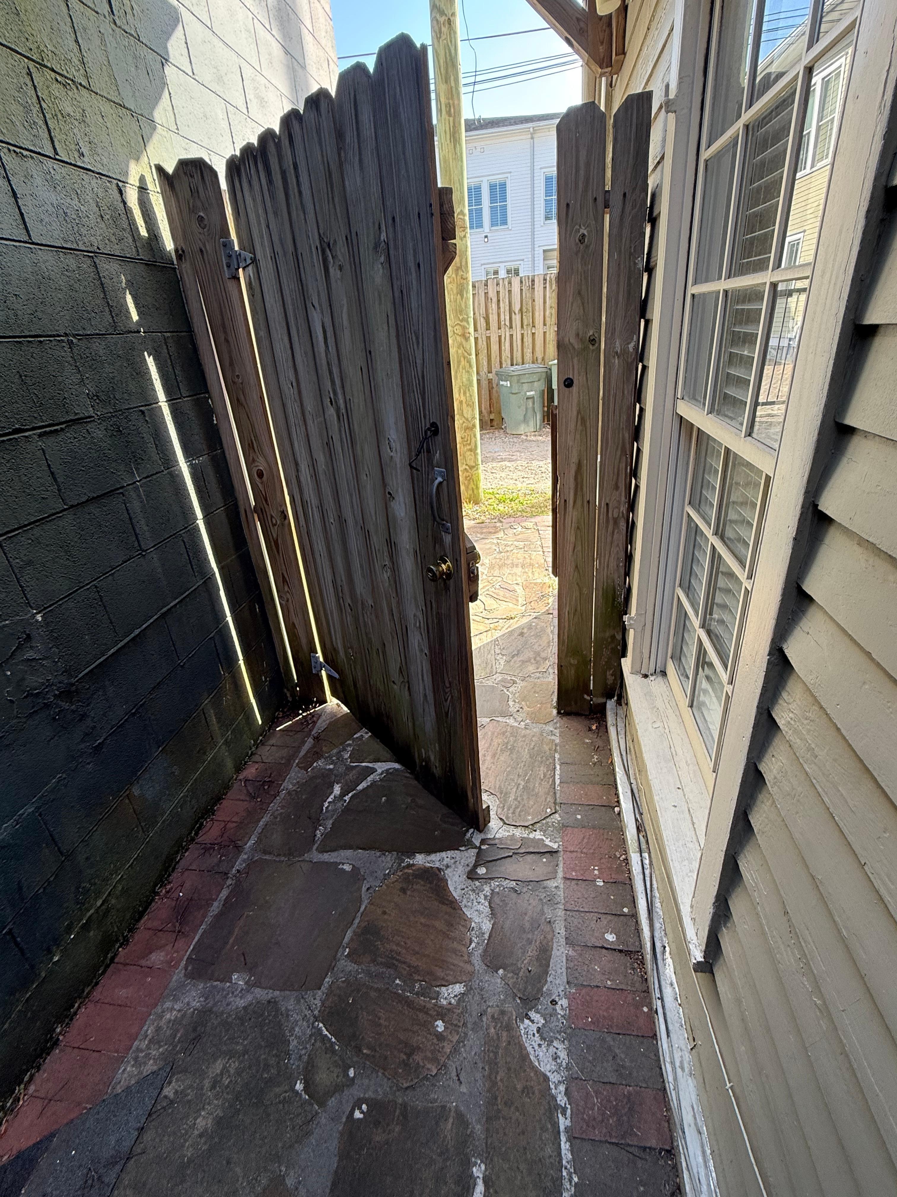 Entry gate off hinges, wont open past 18”