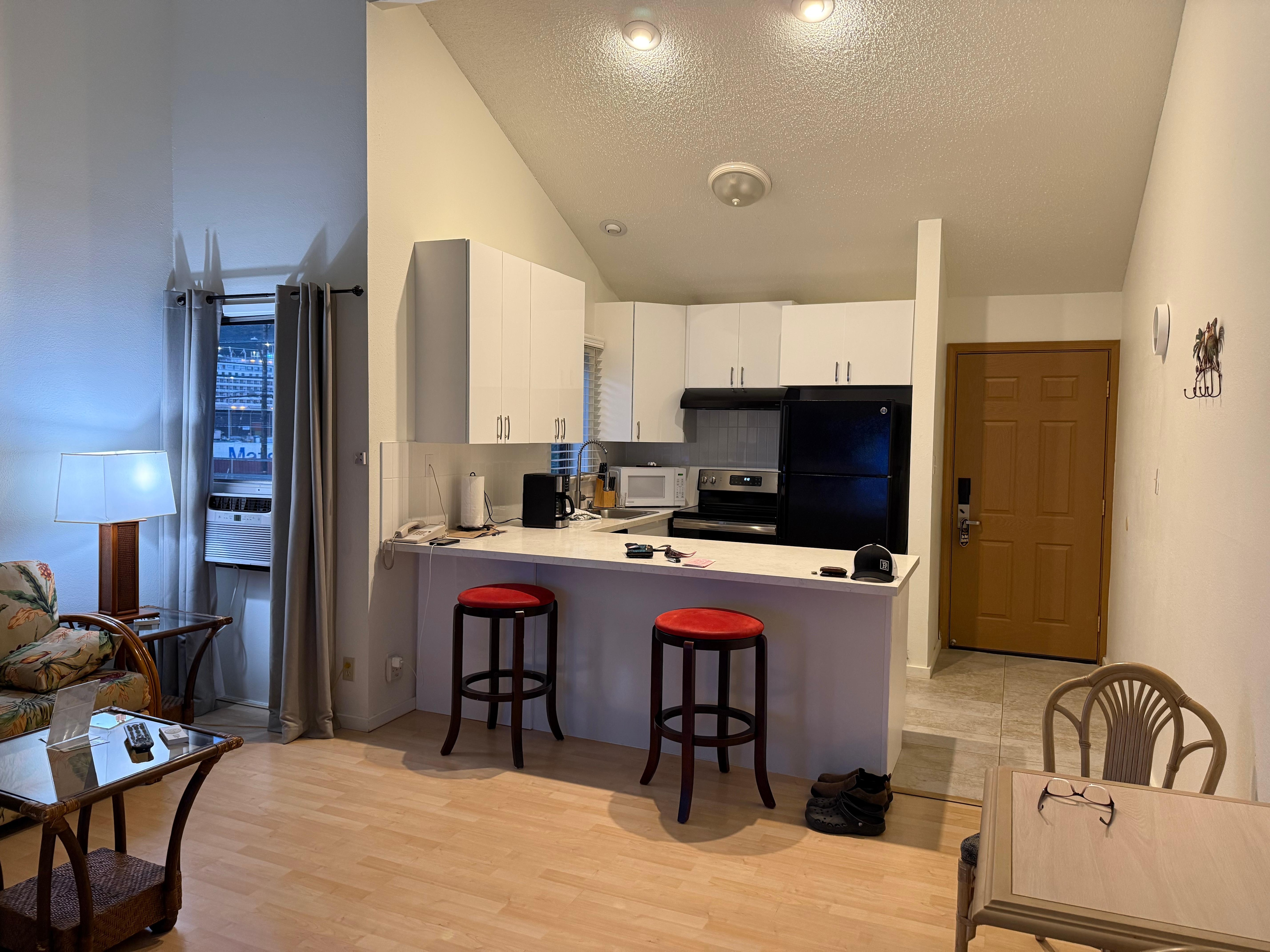 The stool on the left is broken and missing screws.