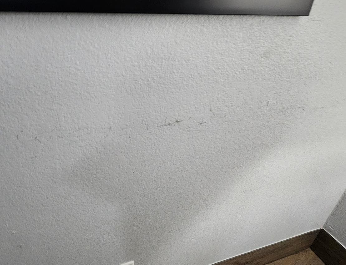 Damage and smudges on wall