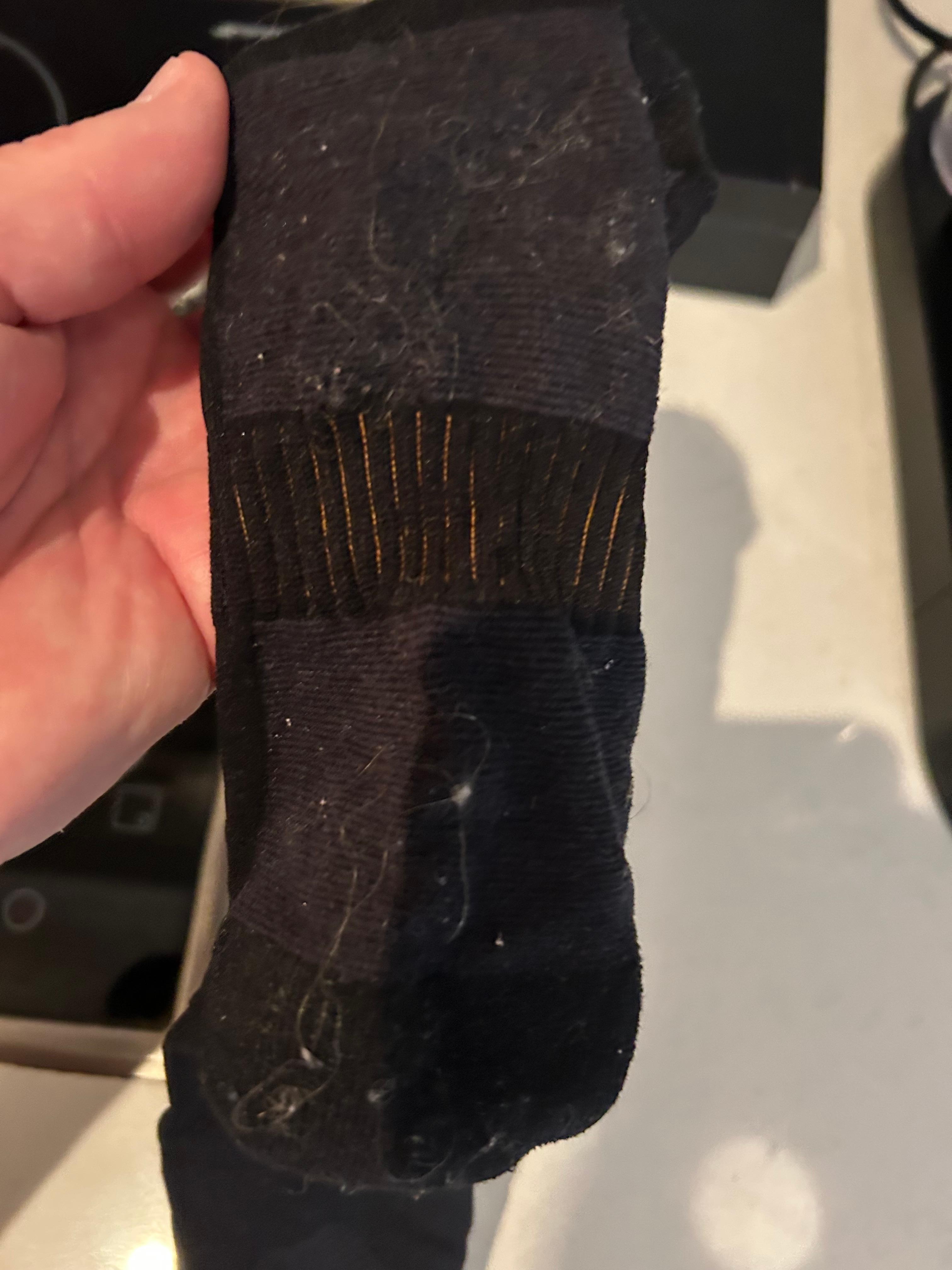 Hair and residue on sock from walking on carpet and floor tiles