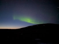 aurora during dusk taken from parking area
